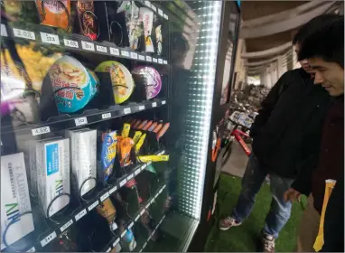  ?? PICTURE: REUTERS ?? MEAN MACHINE: A file picture from Chengdu, Sichuan Province, China. A woman paid Vending Solutions R62 000 for a machine, which proved problemati­c. She asked for her money back, but has received only R20 000.