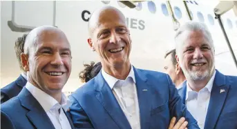  ?? PHOTO D’ARCHIVES, JOËL LEMAY ?? Alain Bellemare, PDG de Bombardier, Thomas Enders, PDG d’airbus, et le premier ministre Couillard, lors de l’annoncé de l’entente sur la C Series, le 27 octobre 2017.