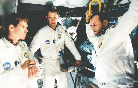  ?? PHOTOS: UNIVERSAL PICTURES ?? The 1995 film Apollo 13, starring Kevin Bacon, left, Tom Hanks and Bill Paxton, follows the harrowing plight of the astronauts during the 1970 space mission.