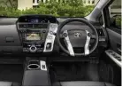  ??  ?? THEIR SAFETY UV-reducing green glass in the windscreen and front windows effortless­ly cuts glare, while a reversing camera* and seven SRS airbags put the safety of your family first. (Prius v i-Tech® model shown)