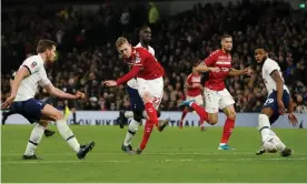  ?? Photograph: Matthew Childs/Action Images via Reuters ?? Middlesbro­ugh’s George Saville scores a late goal to set up a nervy finish for Tottenham.