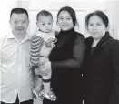  ??  ?? Kang Ying poses with her birth parents and her son before surgery to remove the scar on her forehead. — Li Qian
