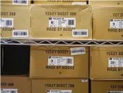  ?? SETH WENIG / AP ?? Boxes of Yeezy shoes made by Adidas are seen at Laced Up, a sneaker resale store in Paramus, New Jersey. It’s not clear what the shoe company plans to do with the product now that it won’t be sold.