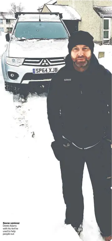  ??  ?? Snow saviour Derek Adams with his 4x4 he used to help people out