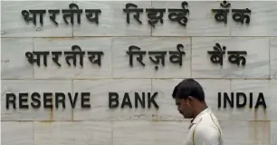  ?? — AFP ?? The RBI’s monetary policy committee raised the repo rate by 25 basis points to 6.50 per cent.