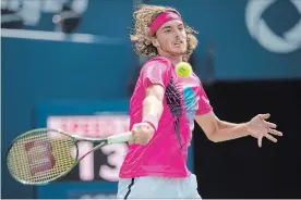  ?? FRANK GUNN THE CANADIAN PRESS ?? Stefanos Tsitsipas hits a forehand to Alexander Zverev during Rogers Cup action Friday.