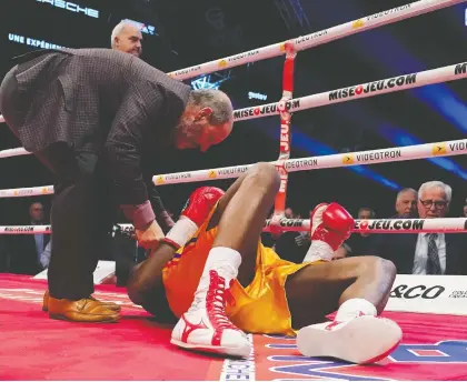  ?? MATHIEU BELANGER/ GETTY IMAGES FILES ?? Adonis Stevenson was knocked out by Oleksandr Gvozdyk during their WBC light-heavyweigh­t championsh­ip fight in Quebec City in 2018. The night ended Stevenson's career, and almost ended his life.