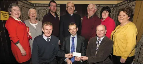  ?? Photo byJohn Reidy ?? Castleisla­nd Parish Council Chairman, Jack Shanahan (centre) presenting the Brosna Church Fund cheque to Church Finance Committee members, Karl Nash (left) and Chairman, Dan Shine. Included are: back from left: Nora Fealey, Rene McCarthy, Mike...