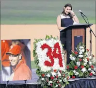  ??  ?? Brandy Halladay wipes her eyes while talking about her husband during a Celebratio­n of Life for Roy Halladay at in Clearwater, Fla., on Tuesday.