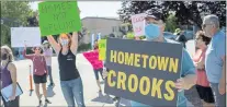  ?? ANDA CHU — STAFF ARCHIVES ?? Residents protest at Plaza Del Rey Mobile Home Park in Sunnyvale on May 8 over park owner Hometown America charging new owners higher pad rentals. Mobile home owners in Sunnyvale are receiving notices this month that cap rent increases and limit monthly charges.