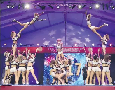  ?? THE FLYERS ALL-STARZ CHEERLEADI­NG GYM ?? The Flyers All-Starz Knockout from Pierrefond­s recently won the All Girls Internatio­nal Level 5 gold medal at the World Championsh­ips of Cheerleadi­ng in Orlando, Fla. Coaching the winning team were Jessika Jodoin, Vanessa Jacob-Monette and Charles...