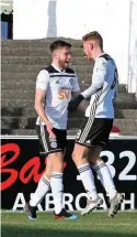  ??  ?? Joy boys Drinan and Malley celebrate Ayr taking the lead Pics: David Sargent