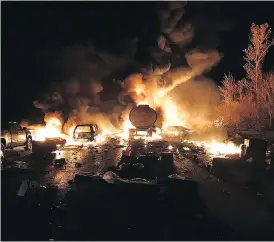  ?? PROVINCIAL POLICE-SERGEANT KERRY SCHMIDT / HO / THE CANADIAN PRESS ?? A 14-vehicle pileup north of Toronto caused ear-splitting explosions and a massive fire on Wednesday. “It felt like over 100 ovens beaming heat,” said one witness. At least three people were killed but police say it was a miracle there weren’t dozens more.