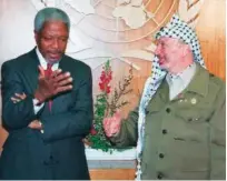  ?? Reuters ?? Kofi Annan talks with Palestinia­n leader Yasser Arafat.