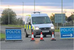  ??  ?? Officers closed the road after the tragedy.