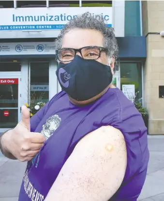  ?? BRENDAN MILLER ?? Mayor Naheed Nenshi received his first COVID-19 shot at the clinic at the TELUS Convention Centre on Thursday. “I want to encourage everyone to get their vaccine as soon as they're able,” he said.