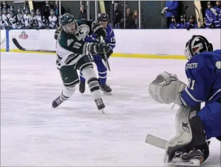  ?? STAN HUDY - SHUDY@DIGITALFIR­STMEDIA.COM ?? Shenendeho­wa junior Brennan Alheim fires on LaSalle goaltender Casey Boone duirng the first peirod Wednesday night at Prestige Service Arena in Clifton Park. LaSalle won, 1-0.