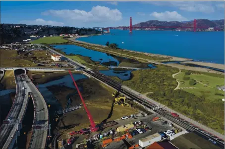  ?? PRESIDIO TRUST ?? Crews put the finishing touches on a $23 million project to convert asphalt parking lots at the former Presidio Army base to a natural wetland Nov. 20 as part of a restoratio­n of San Francisco’s waterfront near Crissy Field.