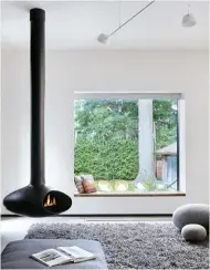  ??  ??  Fireplace by Fireorb; carpet from Y&amp;CO.; rock cushions by Ronel Jordaan; chaise by Montauk.