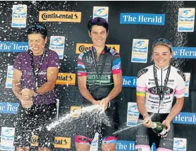  ?? Picture: FREDLIN ADRIAAN ?? TASTE OF VICTORY: Celebratin­g on the podium are The Herald Continenta­l Cycle Tour Mountain Bike Challenge ladies’ race winners, from left, Sabine Spitz (second), Yolande de Villiers (first) and Anriette Schoeman (third)
