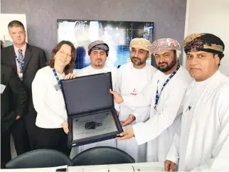  ??  ?? Ali Redha Al-Lawatiya, executive vice president, engineerin­g and maintenanc­e, Oman Air, is presented with a commendati­on at the event.