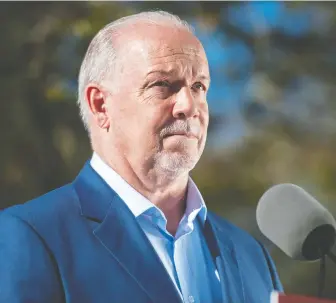  ?? JASON PAYNE/ FILES ?? B.C. NDP Leader John Horgan, seen last month, was questioned about pandemic preparedne­ss, Site C, and calling a snap election, among other topics, during the second leaders' debate on Thursday.