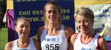  ??  ?? The top three in the county ladies’ Senior cross-country (from left): Jackie Carthy (Kilmore, third), Fiona Kehoe (Kilmore, first), Ann Sullivan (D.M.P., third).