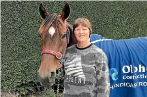  ??  ?? Invercargi­ll owner and co-trainer Debbie Shirley with her 10-win trotter Rydgemont Milly. JAMIE SEARLE/STUFF