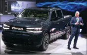  ?? CRAIG RUTTLE — THE ASSOCIATED PRESS ?? Mike Koval, RAM brand chief executive officer, introduces the REV Ram 1500 at the New York Internatio­nal Auto Show in New York on Wednesday.