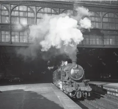  ?? I Krause/Kiddermins­ter Railway Museum ?? Few Beeching station closures offered such an impressive sight, but the writing was already on the wall when this view was recorded on a late afternoon/early evening in August 1964. Departing with a local service for Carstairs is LMS Derby-built Fairburn ‘4MT’ 2-6-4T No 42273 of Dalry Road (64C) shed. New in May 1947, it would still be on the books when that shed was closed on 3 October 1965, albeit a transfer across Edinburgh to the ex-North British shed at St Margarets would ensure the best part of one more year of work before scrapping.