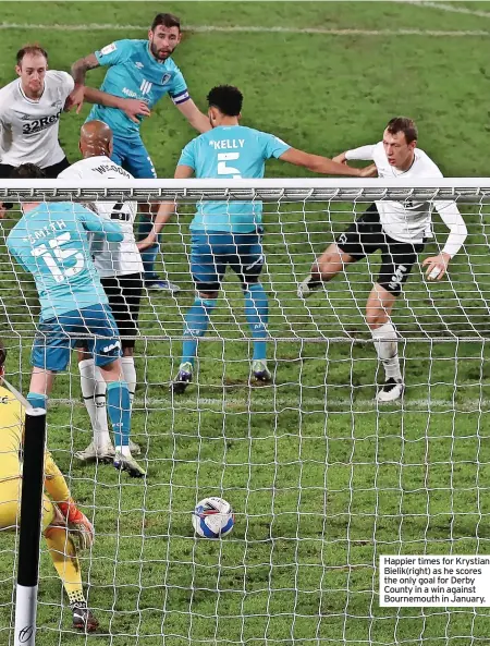  ?? ?? Happier times for Krystian Bielik(right) as he scores the only goal for Derby County in a win against Bournemout­h in January.