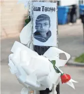  ?? KAMIL KRZACZYNSK­I/GETTY IMAGES ?? A small memorial is seen Thursday where 13-year-old Adam Toledo was shot and killed in March by a Chicago police officer.