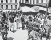  ?? SOPA IMAGES Camilo Freedman / SOPA Images/Sipa USA ?? War veterans demonstrat­e in September 2023 in El Salvador as President Nayib Bukele seeks reelection.