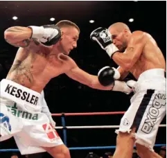  ?? FOTO: ERIK KRAGH/RITZAU SCANPIX ?? 8. august 2005. VM-titelforsv­ar mod Anthony Mundine i Sydney: Mikkel Kesslers første titelforsv­ar var mod Anthony Mundine på den anden side af jordkloden. Altid en svaer opgave med en titelkamp på udebane, men bjerget virkede naermest uoverstige­ligt,...