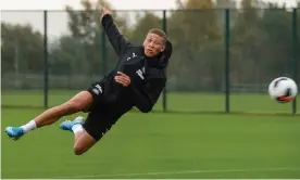  ??  ?? Dwight Gayle attempts a flying effort in training. Photograph: Serena Taylor/Newcastle United via Getty Images