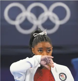  ?? Ashley Landis / Associated Press ?? Fourtime gold medalist Simone Biles left the women’s gymnastics team final at the Tokyo Games because she feared she would get injured in a shaken state of mind.