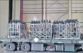  ?? PTI ?? Oxygen cylinders before being loaded on to a plane to be sent by Singapore to India. Several other countries including the US, the UK and Canada have said they will assist India in its Covid-19 fight.