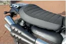  ??  ?? The exhaust is well shielded, and will keep riders comfy during winter rides; a luggage rack is standard equipment.