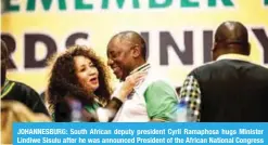  ??  ?? JOHANNESBU­RG: South African deputy president Cyril Ramaphosa hugs Minister Lindiwe Sisulu after he was announced President of the African National Congress (ANC) yesterday.