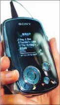  ?? ISSEI KATO PHOTO/REUTERS ?? Sony’s portable Walkman A Series hard disk player can play MP3 files.