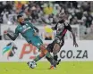  ?? Backpagepi­x ?? MAKHEHLENE Makhaula of Orlando Pirates challenges Taariq Fielies of Amazulu during their Nedbank Cup quarter-final at Moses Mabhida Stadium last night. |