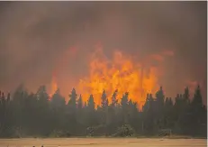  ?? THE CANADIAN PRESS FILE ?? Saskatchew­an is offering British Columbia support similar to what B.C. provided during the 2015 wildfire in La Ronge, above.