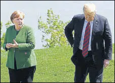  ?? REUTERS ?? Angela Merkel and Donald Trump at the G7 summit.