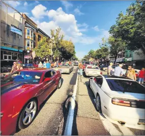  ?? IMAGE FROM SCREENSHOT ?? This image posted on the Red Horse Motoring Club’s Facebook page shows the Aug. 1 car show in downtown Pottstown. Many attending appear to not be wearing masks.