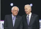  ?? MATT ROURKE — THE ASSOCIATED PRESS FILE ?? Sen. Bernie Sanders, I-Vt., left, and former vice president Joe Biden attend the Democratic presidenti­al primary debate in February in Charleston, S.C.