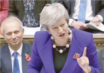  ?? — Reuters ?? Britain’s Prime Minister Theresa May answering a question during the weekly question and answer session, Prime Minister’s Questions (PMQS), in the House of Commons in London.