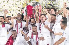  ?? ?? TITLE HOLDERS: Qatar players celebrate winning the Asian Cup in 2019.