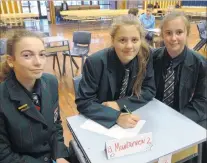  ??  ?? Getting ready . . . Mountainvi­ew High School pupils (from left) Lucy Barge, Arwen Kleinsmith and Rilee Gould (all 13) prepare to compete.