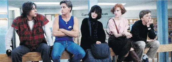  ??  ?? The Breakfast Club works hard to break down stereotype­s and by the end, the kids are all right — starring Judd Nelson, left, Emilio Estevez, Ally Sheedy, Molly Ringwald and Anthony Michael Hall.
