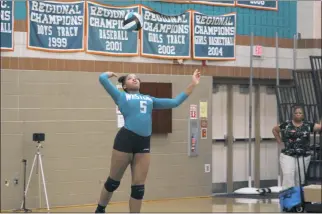  ?? STAFF PHOTO BY JOHN NISWANDER ?? Westlake’s Deidre Gilliard serves a ball during the first set of Tuesday’s Southern Maryland Athletic Conference Potomac Division clash at home versus Lackey. Westlake won the match in straight sets to earn its first victory of the season.